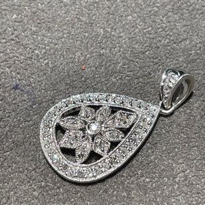 White gold and pave diamond pendant